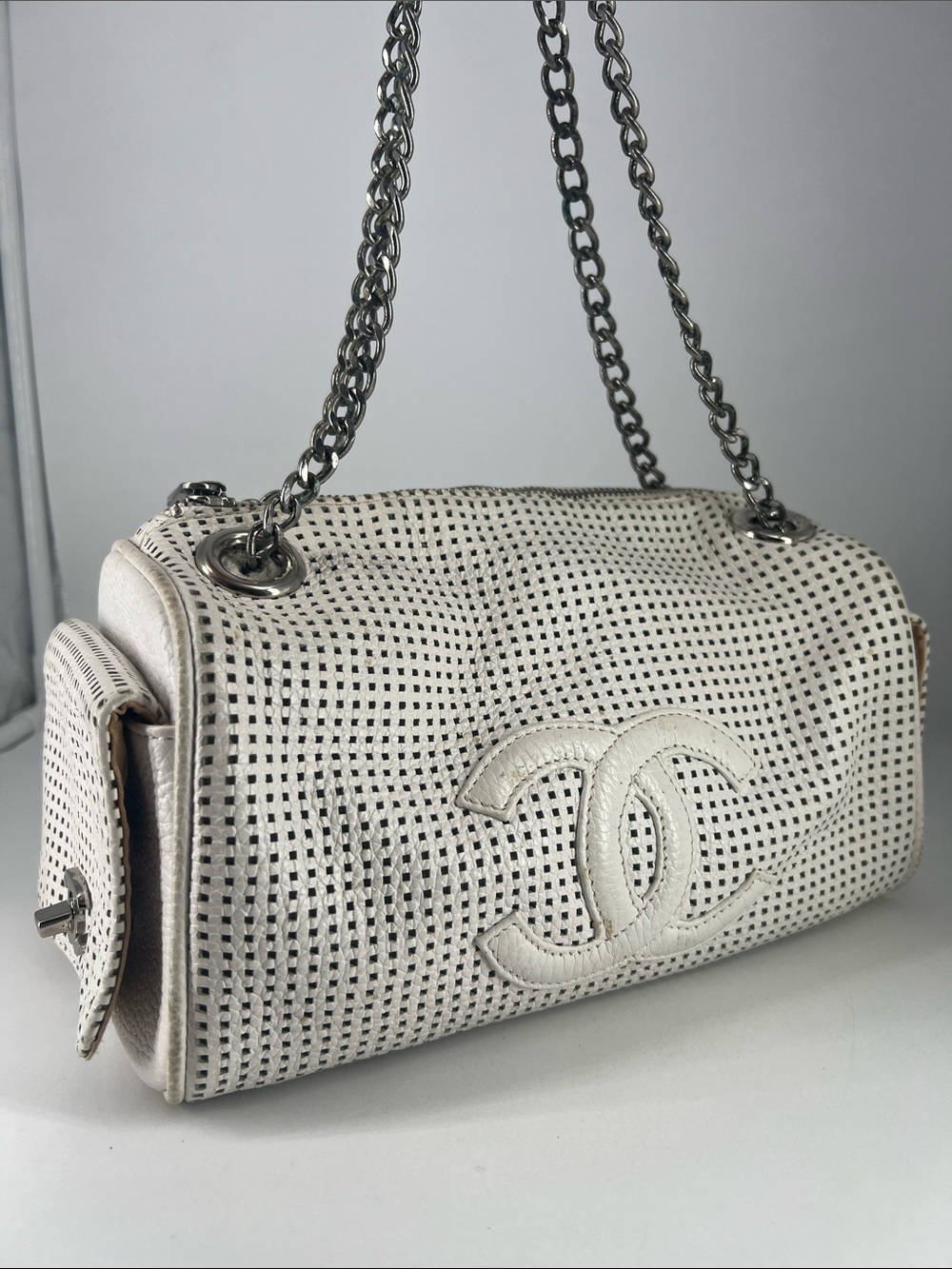 RARE VINTAGE Perforated Chanel White Leather With Silver Chain and side Pockets